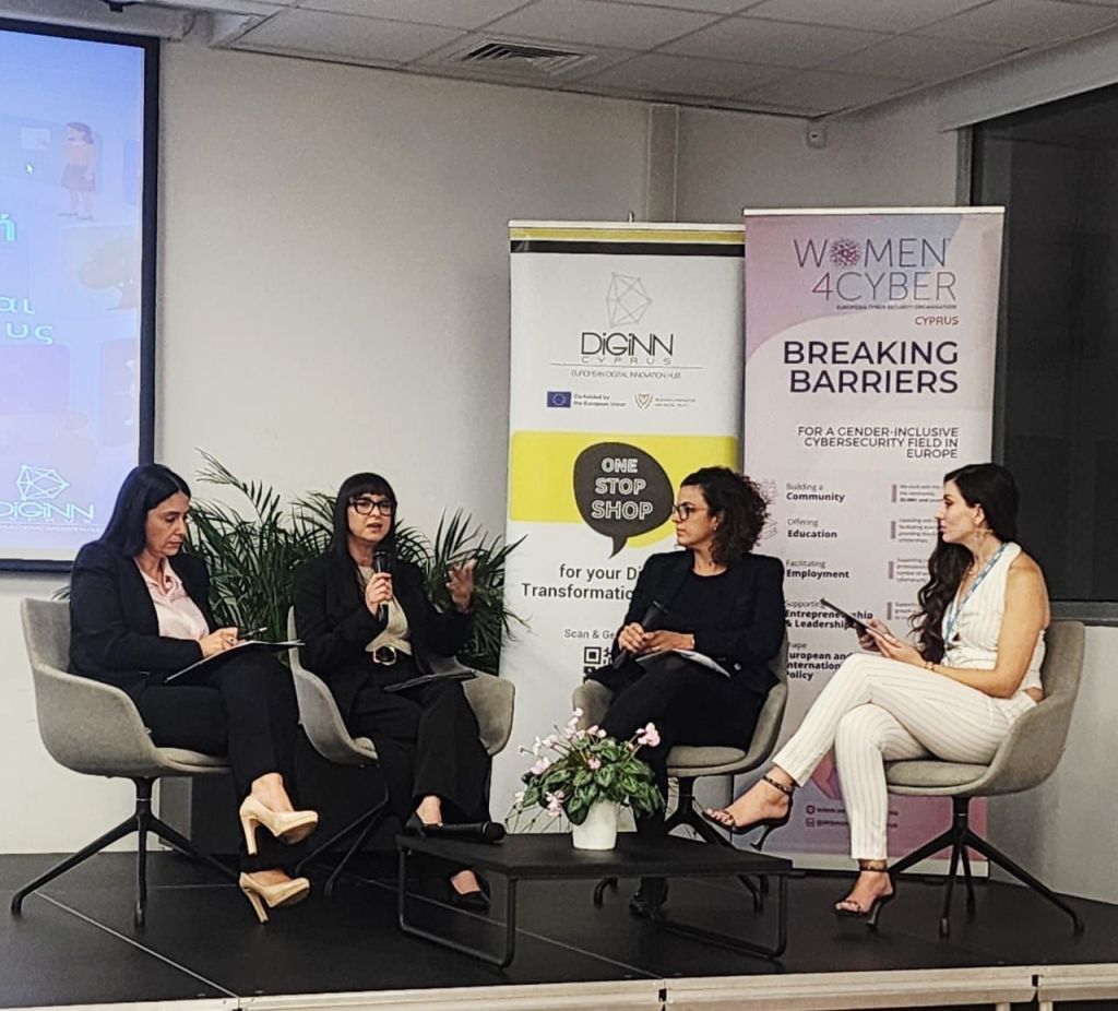 Four people in a panel discussion